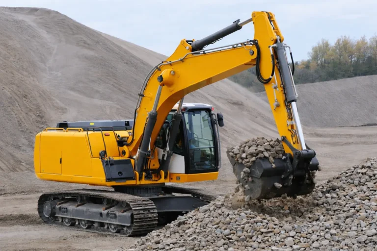 Construction excavator for concrete and hydraulic hose applications